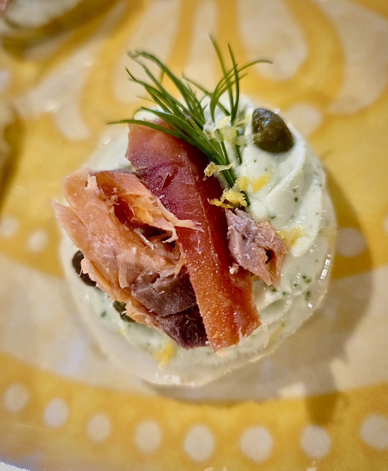 Smoked salmon cucumber bites with lemon, dill and capers by UNEARTH'D catering
